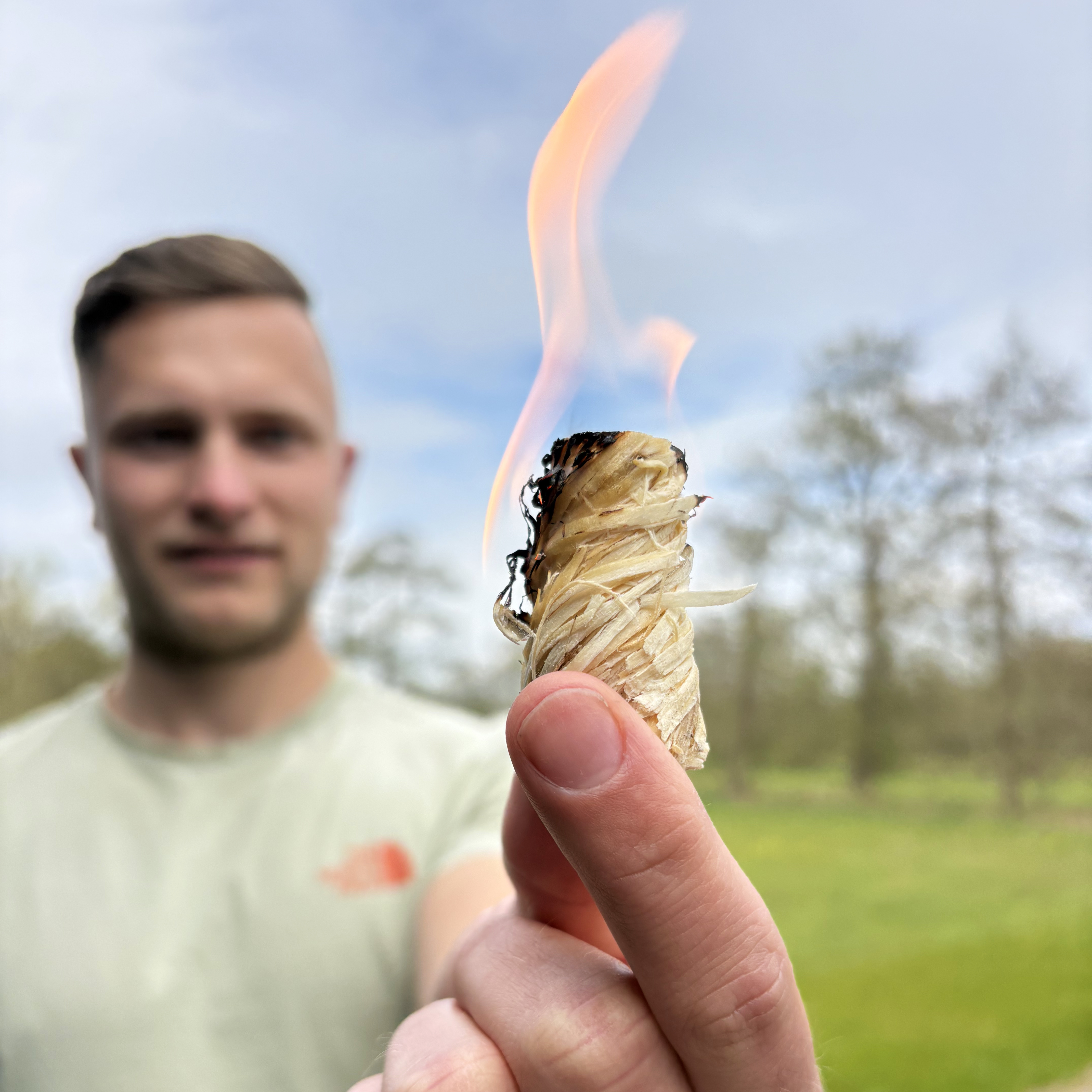 A STOCERS wood wool firelighter burning outdoors